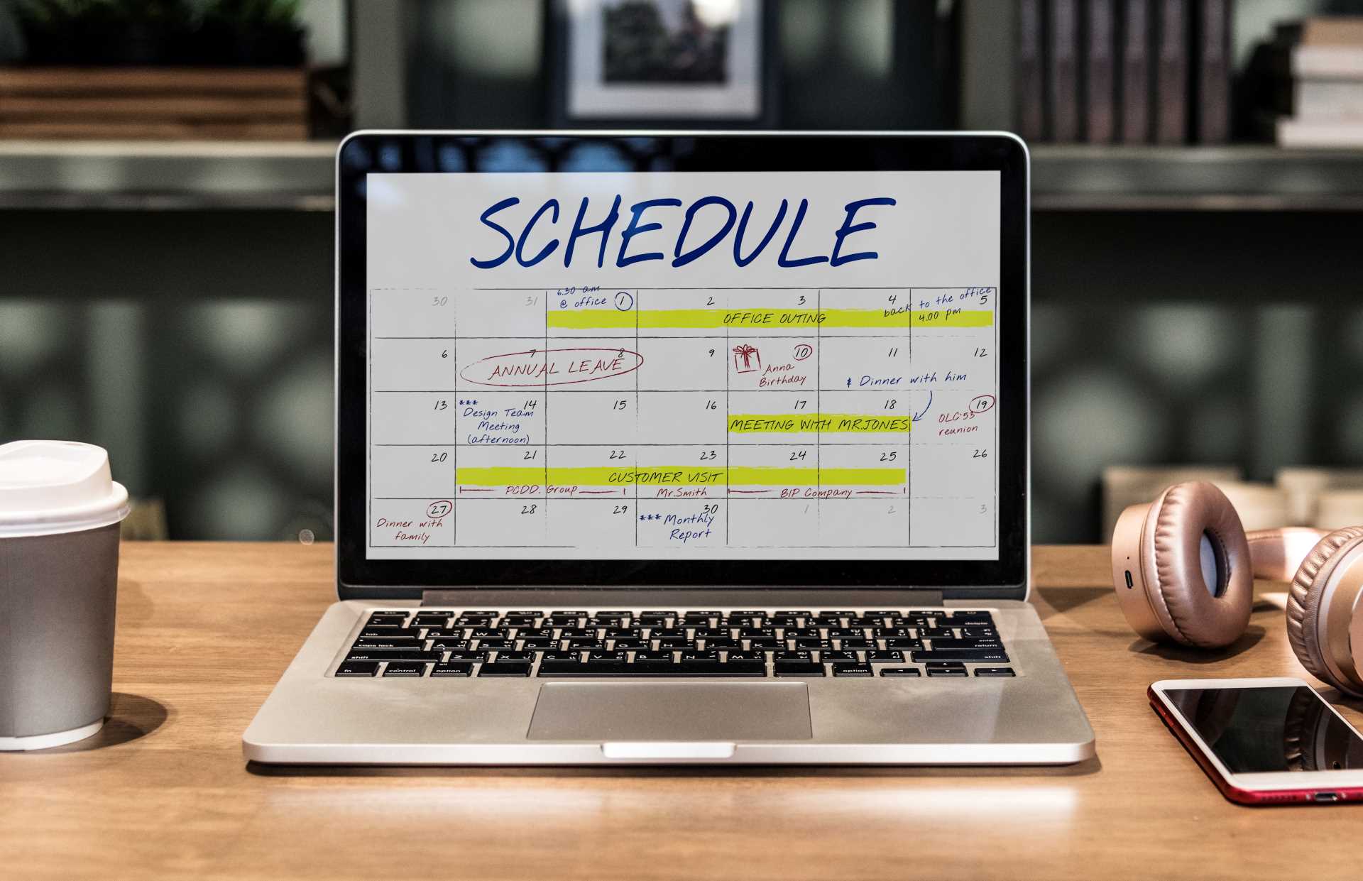 automated scheduling software, laptop with a calendar schedule