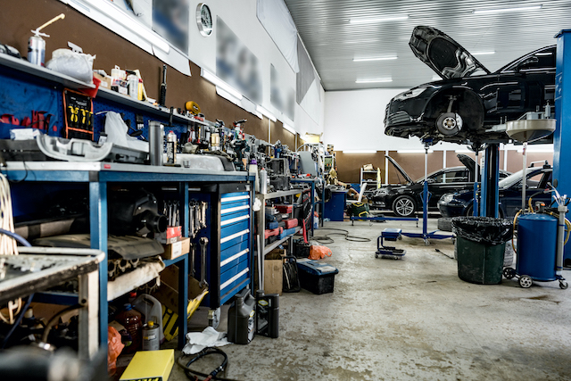 Busy garage, garage tools at the workstation.